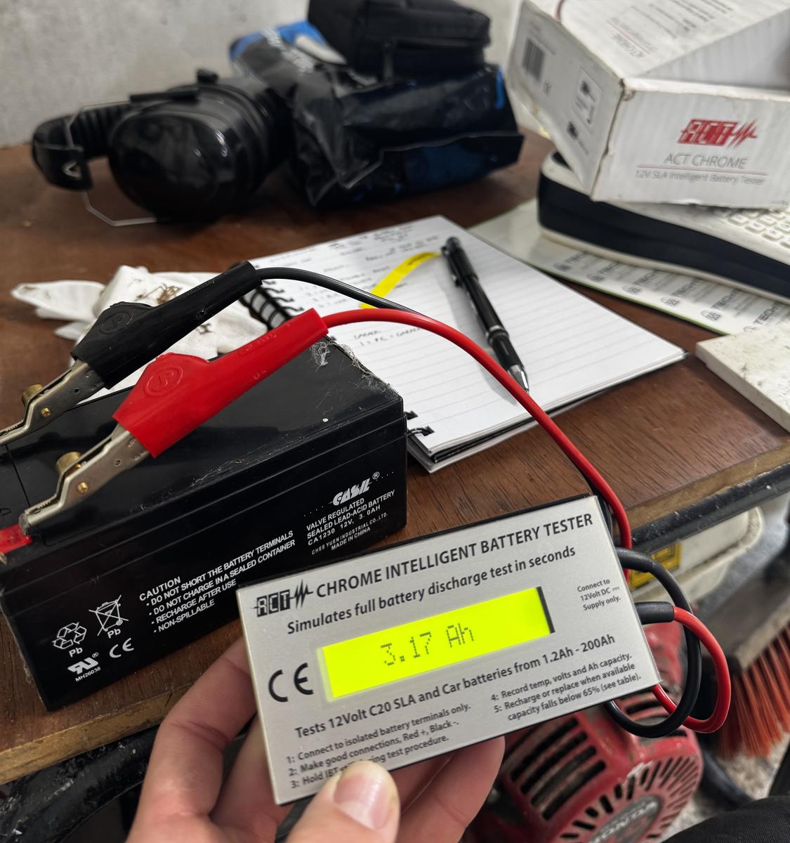 Alarm standby battery being load-tested before handover