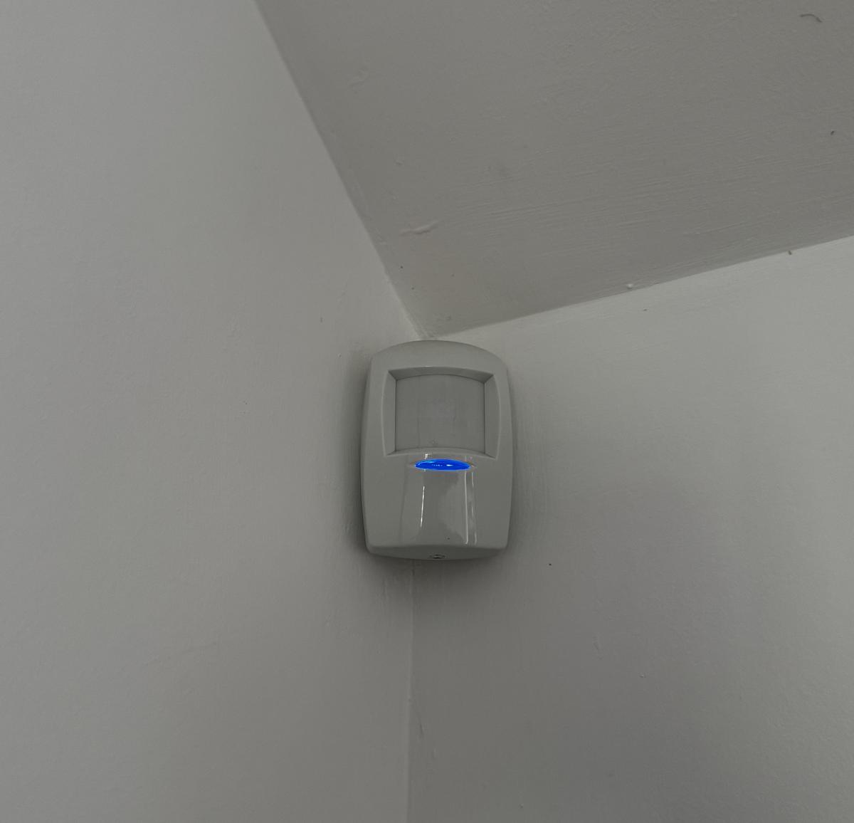 Movement detector in the corner of a room