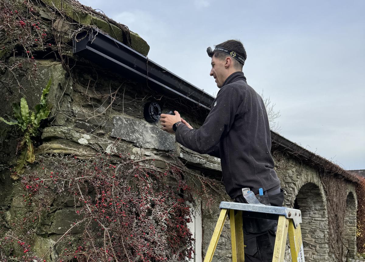 Techtrix engineer fitting a CCTV camera