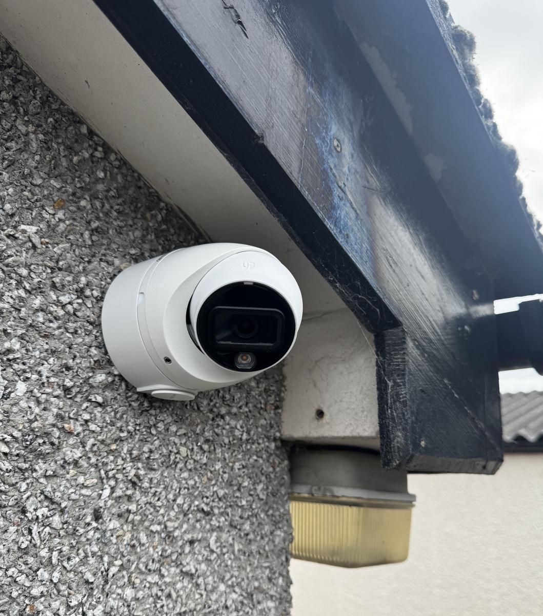 CCTV camera under the eaves of a house in Magheralin